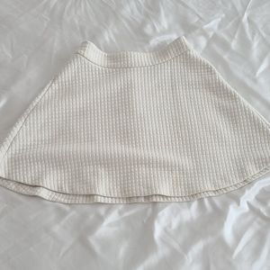 Pleated off white flair skirt